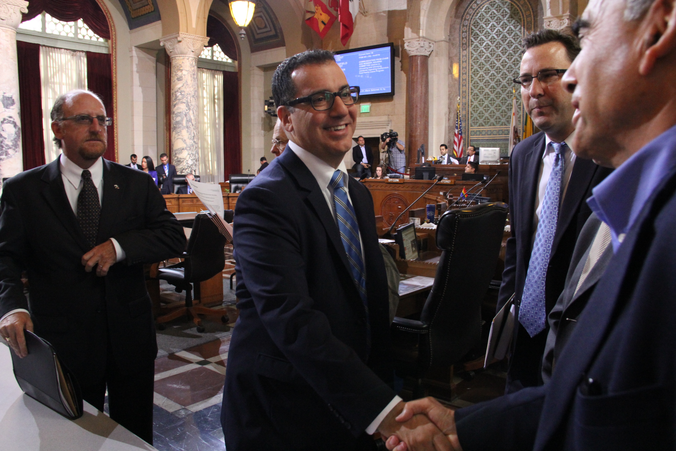 Councilmember Blumenfield shakes hands with Jacob Segal of the Southern California Israel Chamber of Commerce (SCICC), following the unanimous vote in favor of establishing the Los Angeles/Eilat Innovation and Cooperation Task Force, May 23, 2014.